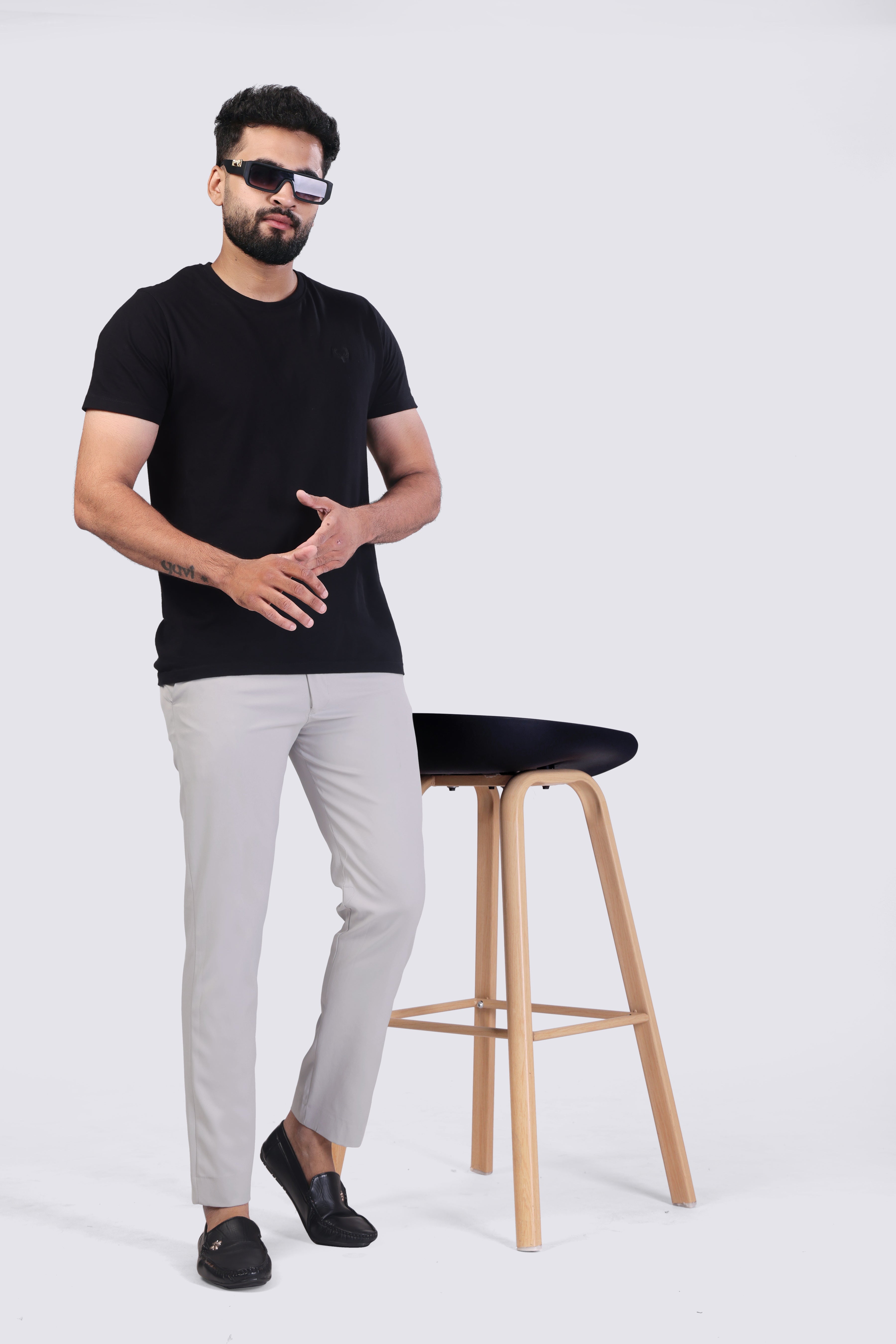 Light gray pleated plain ankle length trousers for men